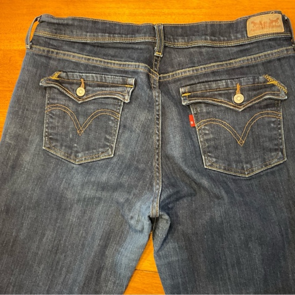 Levi Boot Cut 515 Jeans with back flap pockets and rare single "R" red tag.  14.